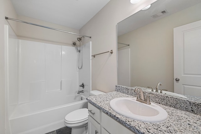 full bathroom with toilet, vanity, and shower / bath combination