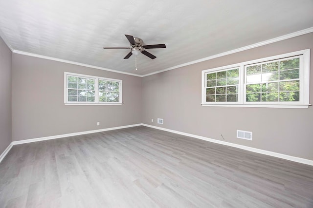 5906 Forrest Rd, Columbus, GA 31907 - empty room with a ceiling fan, wood finished floors, and crown molding