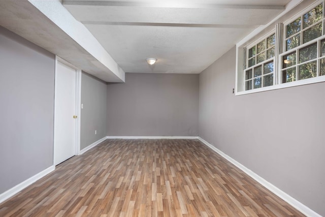 5906 Forrest Rd, Columbus, GA 31907 - below grade area with wood finished floors and baseboards