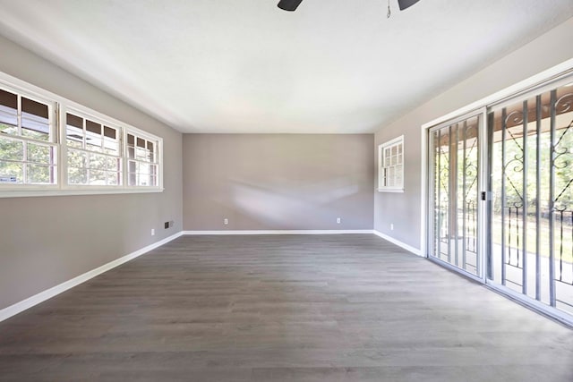 5906 Forrest Rd, Columbus, GA 31907 - spare room featuring a ceiling fan and dark wood-type flooring