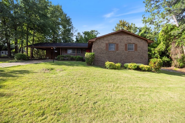 5906 Forrest Rd, Columbus, GA 31907 - single story home featuring brick siding, driveway, a front lawn, and an attached carport