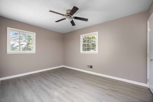 5906 Forrest Rd, Columbus, GA 31907 - spare room with wood finished floors and a ceiling fan