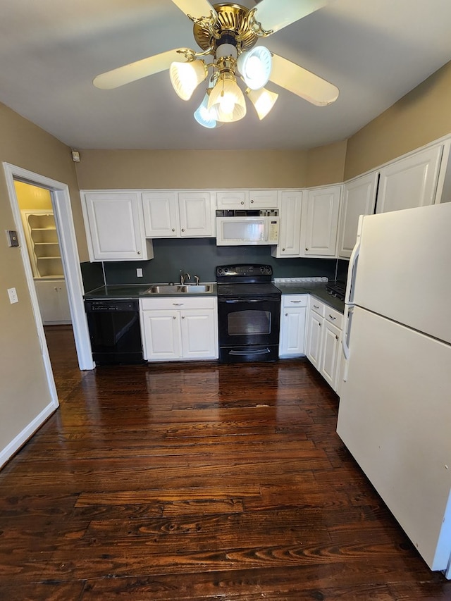 1640 Preston Dr, Columbus, GA 31906 - kitchen featuring black appliances, ceiling fan, dark countertops, white cabinets, and dark wood finished floors