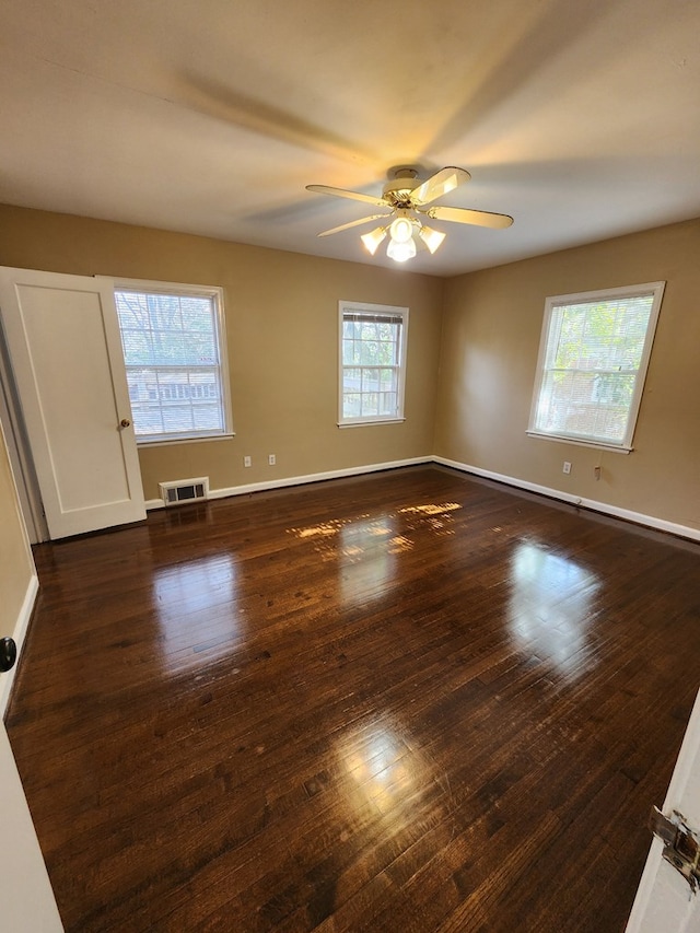 1640 Preston Dr, Columbus, GA 31906 - empty room with ceiling fan and dark wood-type flooring