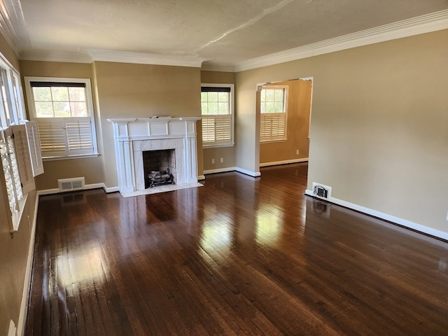 1640 Preston Dr, Columbus, GA 31906 - unfurnished living room with wood finished floors, healthy amount of natural light, a fireplace, and crown molding
