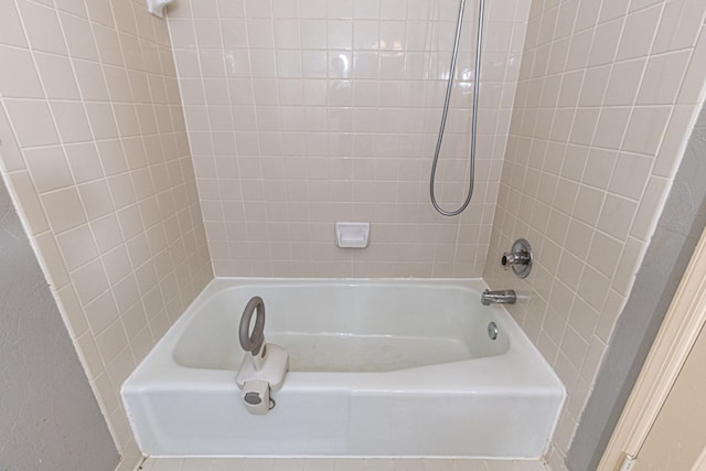 bathroom featuring tub / shower combination