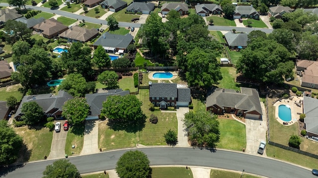 7310 Westport Loop, Midland, GA 31820 - aerial overview of property's location with a pool and nearby suburban area