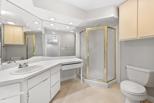full bath featuring toilet, ceiling fan, recessed lighting, a shower stall, and vanity