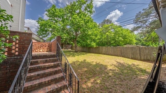 view of yard featuring stairs
