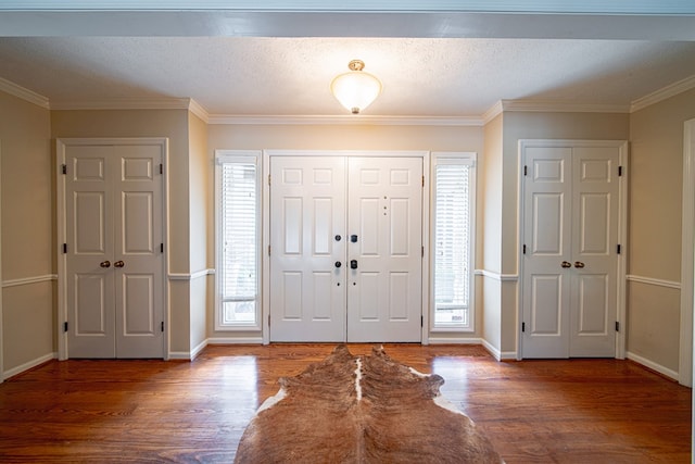 6130 Bristol Blvd, Columbus, GA 31904 - entrance foyer with healthy amount of natural light, wood finished floors, and ornamental molding