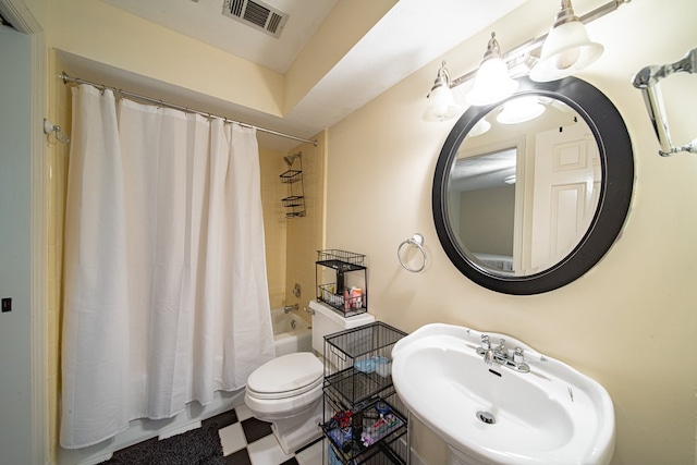 6130 Bristol Blvd, Columbus, GA 31904 - bathroom with a sink and shower / bath combination with curtain