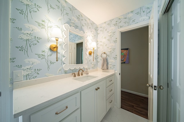 6130 Bristol Blvd, Columbus, GA 31904 - bathroom with vanity, wallpapered walls, and tile patterned flooring