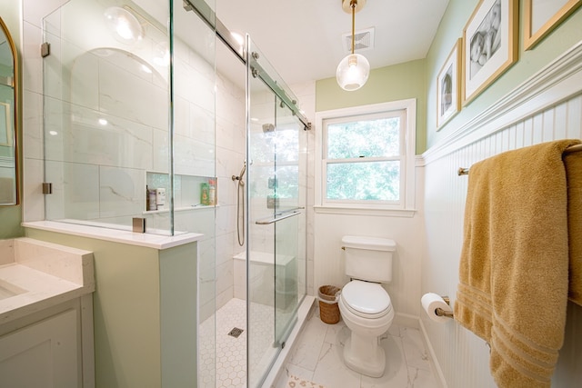 6130 Bristol Blvd, Columbus, GA 31904 - full bathroom with vanity, a stall shower, and marble look tile flooring