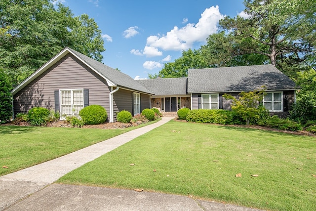 6130 Bristol Blvd, Columbus, GA 31904 - ranch-style house with a front lawn and a shingled roof