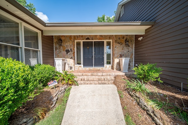 6130 Bristol Blvd, Columbus, GA 31904 - property entrance featuring stone siding and a porch