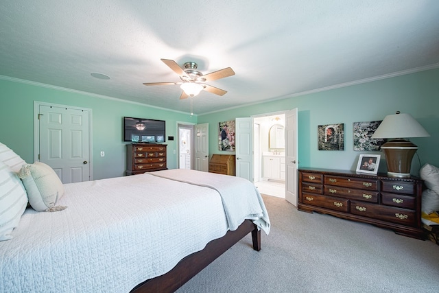 6130 Bristol Blvd, Columbus, GA 31904 - carpeted bedroom featuring ornamental molding, connected bathroom, and ceiling fan