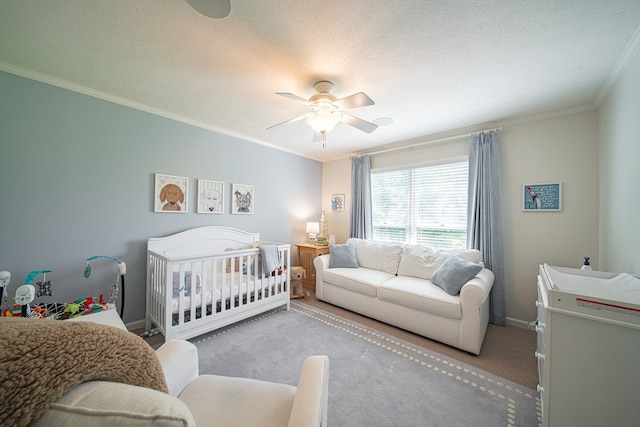 6130 Bristol Blvd, Columbus, GA 31904 - bedroom with crown molding, carpet, a ceiling fan, and a textured ceiling