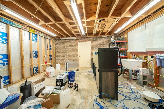 6130 Bristol Blvd, Columbus, GA 31904 - unfinished basement featuring brick wall
