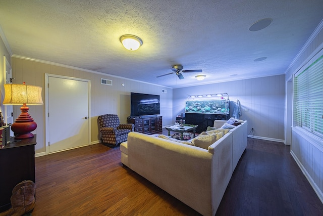 6130 Bristol Blvd, Columbus, GA 31904 - living area featuring wood finished floors, ceiling fan, ornamental molding, and a textured ceiling