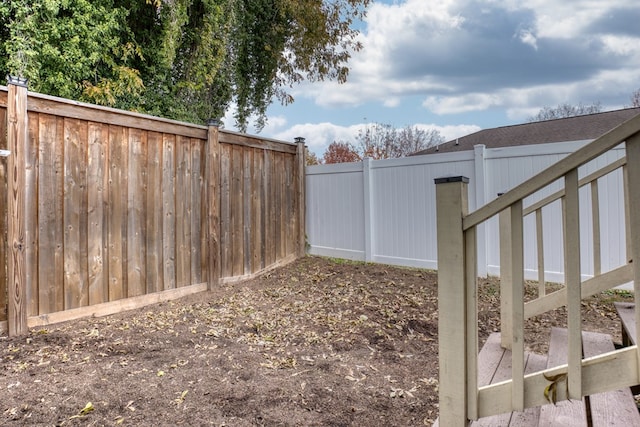 view of yard featuring fence