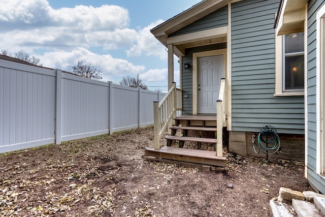 property entrance featuring fence