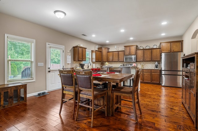 51 New Castle Dr, Phenix City, AL 36870 - dining space featuring dark wood finished floors and recessed lighting