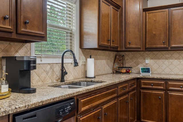 51 New Castle Dr, Phenix City, AL 36870 - kitchen featuring dishwashing machine, healthy amount of natural light, and backsplash