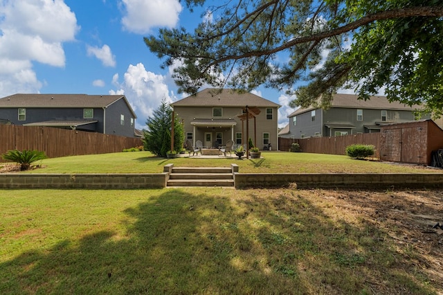 51 New Castle Dr, Phenix City, AL 36870 - back of house with a patio area and a fenced backyard