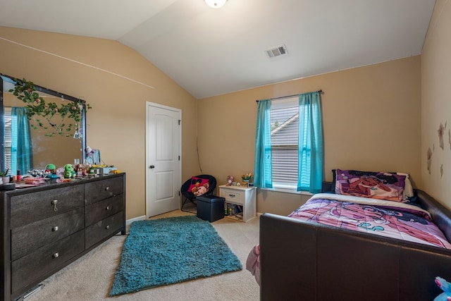 51 New Castle Dr, Phenix City, AL 36870 - bedroom featuring lofted ceiling and light carpet