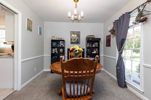 3224 Modler Dr, Columbus, GA 31909 - carpeted dining room featuring a chandelier and healthy amount of natural light