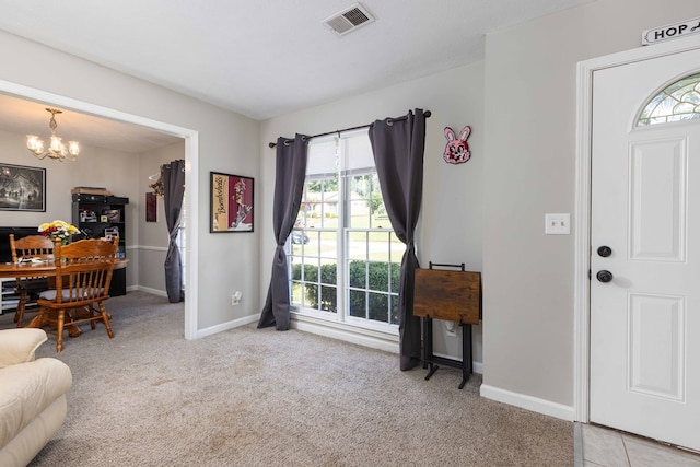 3224 Modler Dr, Columbus, GA 31909 - carpeted entrance foyer featuring a chandelier and baseboards