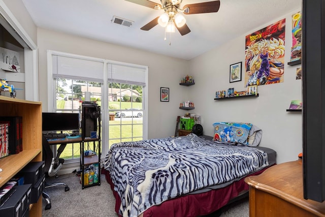 3224 Modler Dr, Columbus, GA 31909 - carpeted bedroom with a desk and a ceiling fan
