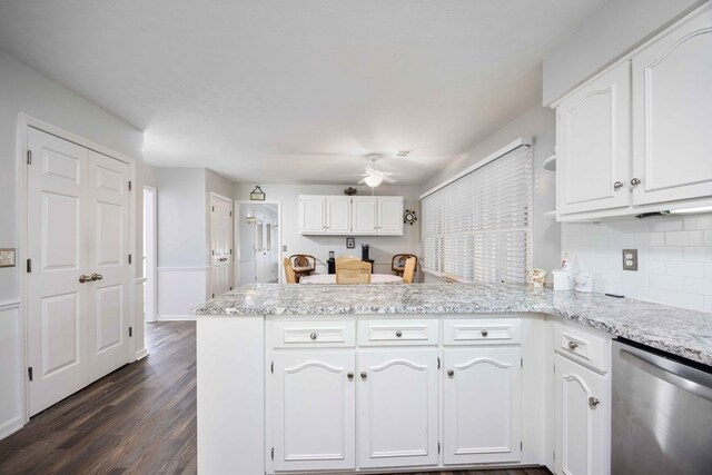 6138 Seaton Dr, Columbus, GA 31909 - kitchen with dishwasher, a peninsula, a ceiling fan, white cabinetry, and dark wood-style flooring