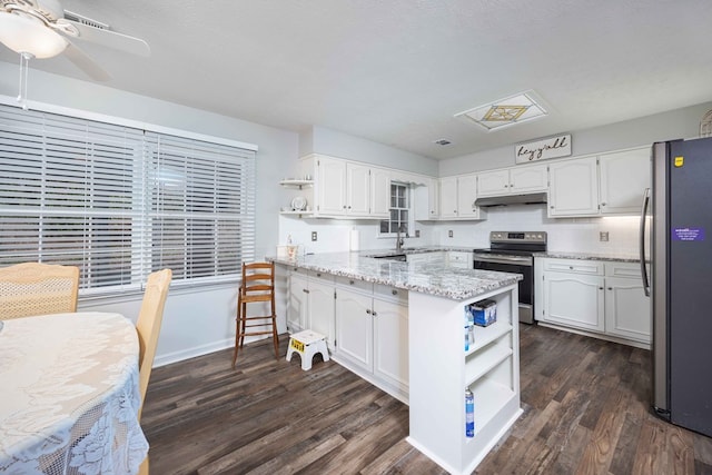 6138 Seaton Dr, Columbus, GA 31909 - kitchen featuring stainless steel appliances, open shelves, dark wood-style floors, and white cabinets