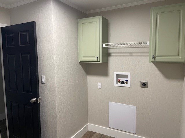 62 Brannon Montgomery Rd, Mauk, GA 31058 - laundry area featuring dark wood-style flooring, baseboards, hookup for a washing machine, electric dryer hookup, and cabinet space