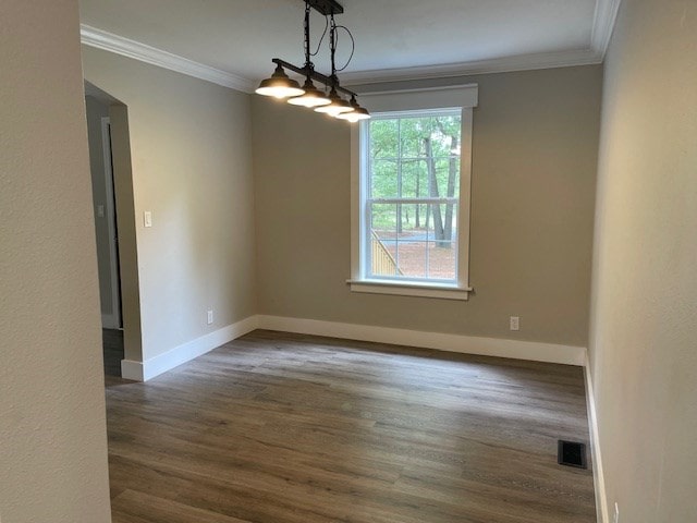 62 Brannon Montgomery Rd, Mauk, GA 31058 - spare room with baseboards, visible vents, ornamental molding, and wood finished floors