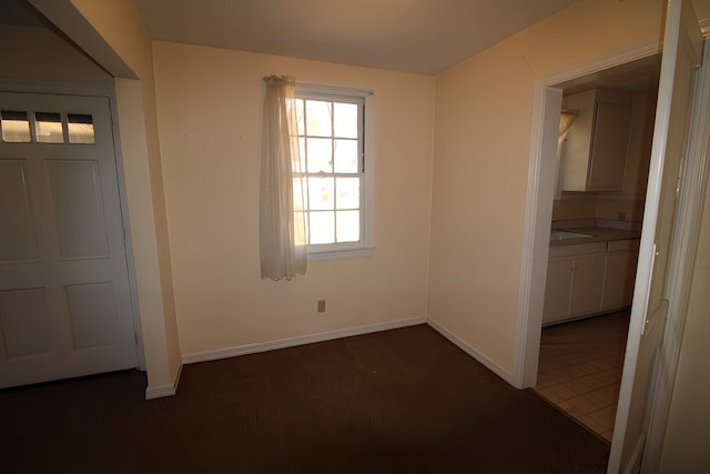 unfurnished bedroom featuring sink