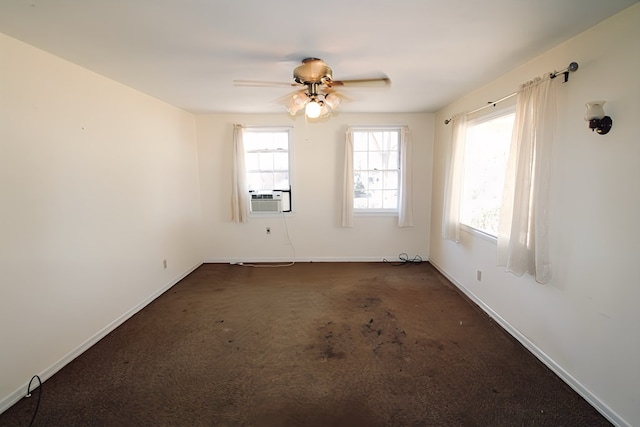 carpeted empty room with cooling unit and ceiling fan