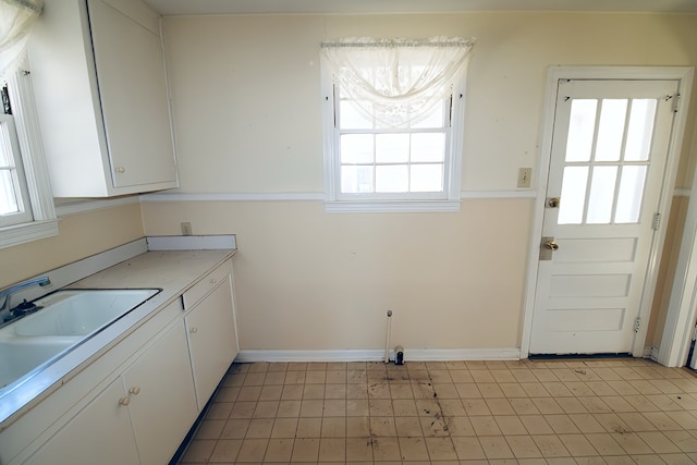 laundry area with sink