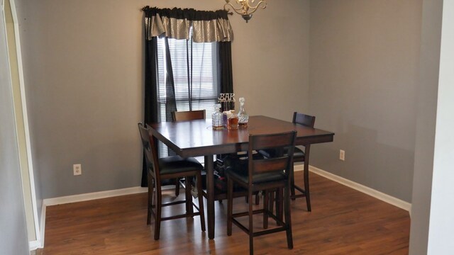 908 Arlington Dr, Columbus, GA 31907 - dining area with a chandelier and wood finished floors