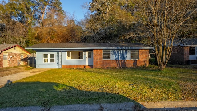 ranch-style house with a front lawn