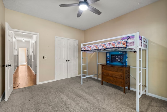 7096 Southwind Ct, Columbus, GA 31909 - bedroom with carpet, baseboards, ceiling fan, and a closet