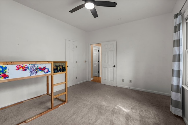 7096 Southwind Ct, Columbus, GA 31909 - unfurnished bedroom with carpet floors, baseboards, and ceiling fan