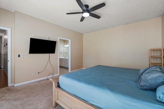 7096 Southwind Ct, Columbus, GA 31909 - bedroom with light colored carpet, baseboards, ensuite bathroom, and a ceiling fan