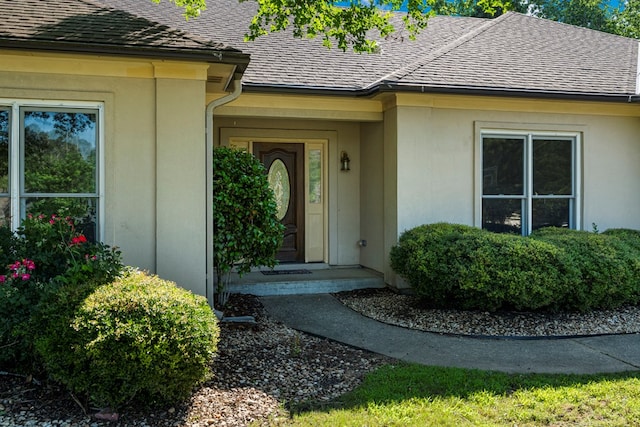 7096 Southwind Ct, Columbus, GA 31909 - entrance to property featuring a shingled roof and stucco siding