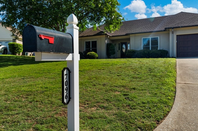 7096 Southwind Ct, Columbus, GA 31909 - exterior view of driveway and a shingled roof