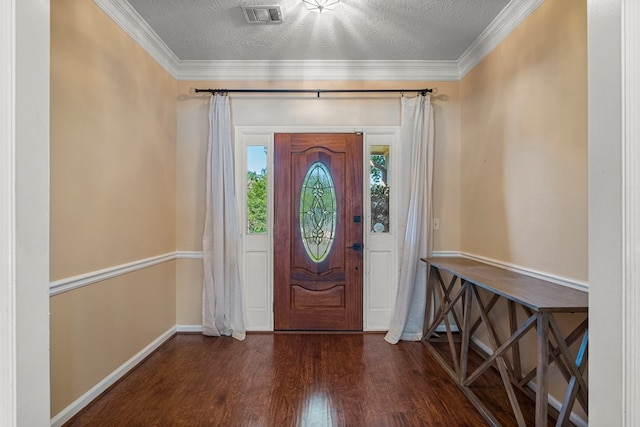 7096 Southwind Ct, Columbus, GA 31909 - foyer featuring wood finished floors, a textured ceiling, baseboards, and crown molding