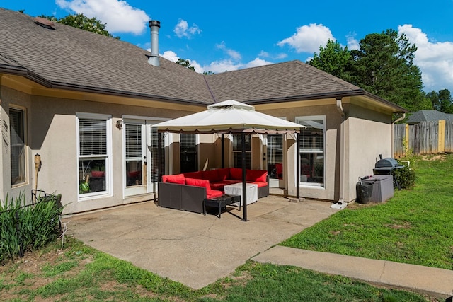 7096 Southwind Ct, Columbus, GA 31909 - back of property with an outdoor living space, a patio area, stucco siding, and a gazebo