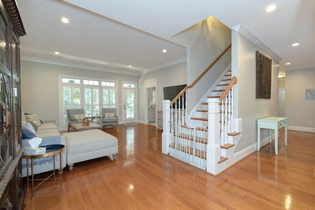 5023 Masters Ln, Columbus, GA 31909 - living area featuring wood finished floors, crown molding, stairway, and recessed lighting