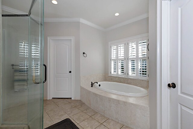5023 Masters Ln, Columbus, GA 31909 - bathroom featuring a garden tub, a stall shower, crown molding, tile patterned floors, and recessed lighting